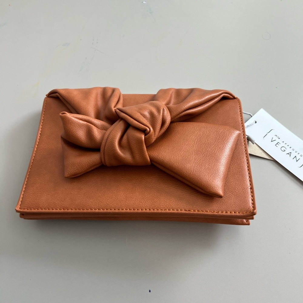 NWT VEGAN LEATHER BOW CLUTCH